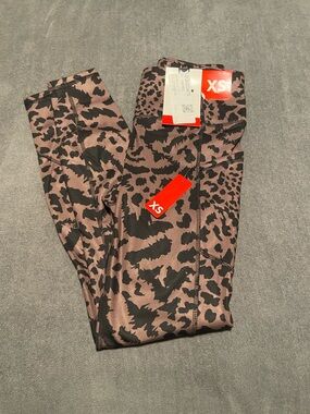 Animal Print Leggings in a Brown and Black - XS